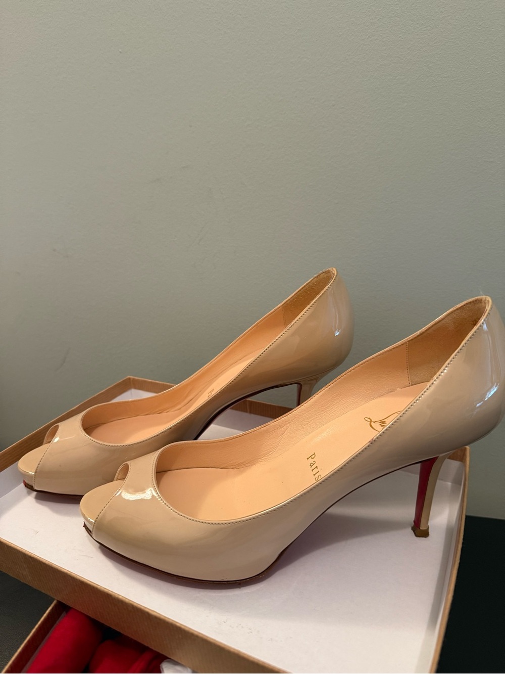 CHRISTIAN LOUBOUTIN Nude/Beige Patent Peep-Toe Pumps with Red Soles